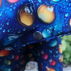 Passe-bras avec pression de maintien sur cape adulte Bulles Rêvées